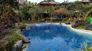 3 outdoor pools, open 9:00 AM to 10:00 PM, pool umbrellas, pool loungers