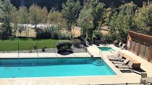 Outdoor pool, open 9:00 AM to 10:00 PM, sun loungers