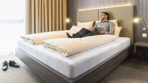 Premium bedding, desk, blackout drapes, soundproofing
