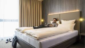 Premium bedding, desk, blackout drapes, soundproofing
