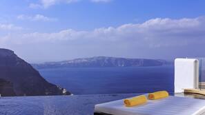2 outdoor pools, pool umbrellas, sun loungers