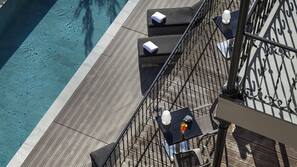 Outdoor pool, pool umbrellas, sun loungers