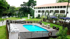 Outdoor pool, open 9 AM to 9 PM, pool umbrellas, pool loungers