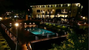 Outdoor pool, open 9 AM to 9 PM, pool umbrellas, pool loungers