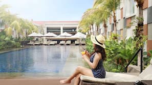 Outdoor pool, pool umbrellas, pool loungers