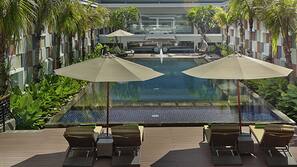 Outdoor pool, pool umbrellas, pool loungers