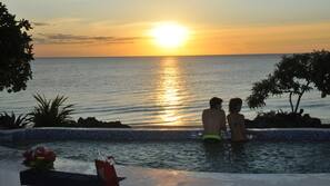 2 outdoor pools, pool umbrellas, pool loungers