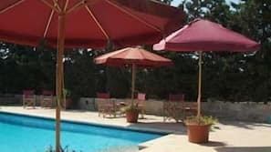 Outdoor pool, pool umbrellas, pool loungers
