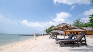Private beach, white sand, sun-loungers, beach umbrellas