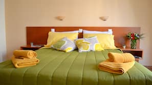 Premium bedding, down comforters, in-room safe, free WiFi
