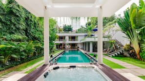 Outdoor pool, pool umbrellas, pool loungers