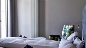 Premium bedding, down comforters, in-room safe, desk