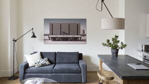 48-inch flat-screen TV with satellite channels, pay movies
