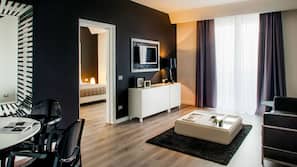 Ropa de cama de alta calidad, minibar, caja fuerte y escritorio