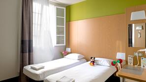 Down comforters, desk, blackout drapes, soundproofing