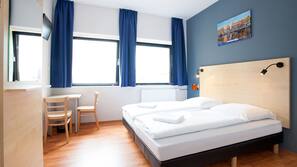 Desk, blackout curtains, free cots/infant beds, free WiFi