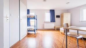 Desk, blackout curtains, free cots/infant beds, free WiFi