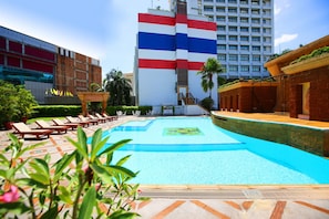 Outdoor pool, pool umbrellas, sun loungers