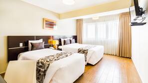 20 bedrooms, premium bedding, in-room safe, desk