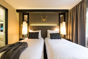 Comfort Twin | Premium bedding, in-room safe, desk, iron/ironing board