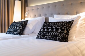 Comfort Queen | Premium bedding, in-room safe, desk, iron/ironing board