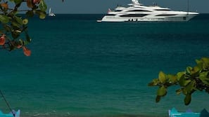 On the beach, sun-loungers, beach bar