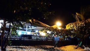 On the beach, sun-loungers, beach bar