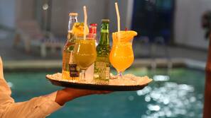 Outdoor pool, pool umbrellas, sun loungers