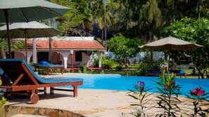 Outdoor pool, pool umbrellas, pool loungers