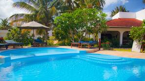 Outdoor pool, pool umbrellas, pool loungers