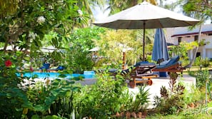 Outdoor pool, pool umbrellas, pool loungers