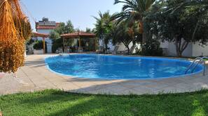 Outdoor pool, pool umbrellas, pool loungers
