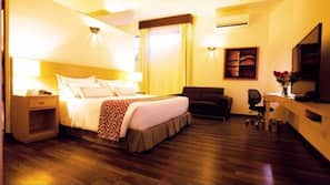 Ropa de cama de alta calidad, minibar, caja fuerte y escritorio
