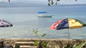 Private beach, sun loungers, beach massages, snorkeling