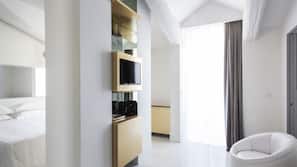 Luxe beddengoed, een minibar, een kluis op de kamer, een bureau