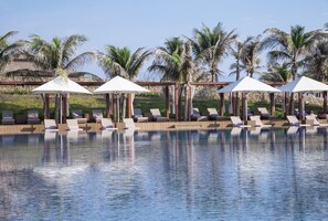 2 outdoor pools, open 6:00 AM to 6:00 PM, pool umbrellas, sun loungers