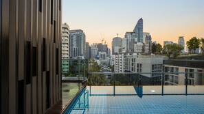 Outdoor pool, pool umbrellas, pool loungers