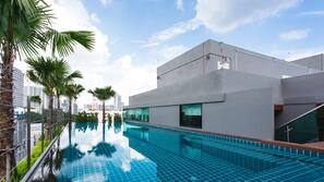 Outdoor pool, pool umbrellas, pool loungers