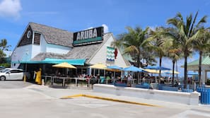 Beach nearby, white sand, beach towels