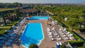 2 outdoor pools, pool umbrellas, pool loungers