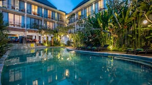 2 outdoor pools, open 7:00 AM to 7:00 PM, pool loungers