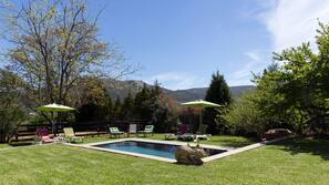 Seasonal outdoor pool, pool umbrellas, pool loungers