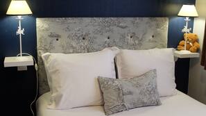 Premium bedding, blackout curtains, cots/infant beds, free WiFi