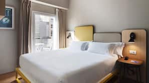 Luxe beddengoed, een minibar, een kluis op de kamer, een bureau