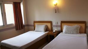 Desk, free WiFi, bed sheets