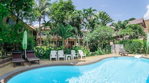 Outdoor pool, pool umbrellas, sun loungers
