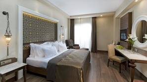 Premium bedding, free minibar, in-room safe, desk