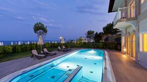 10 outdoor pools, pool umbrellas, pool loungers