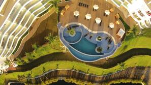 Outdoor pool, open 9:30 AM to 9:30 PM, pool loungers