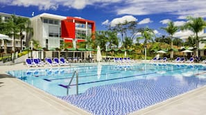 Outdoor pool, open 9:30 AM to 9:30 PM, pool loungers